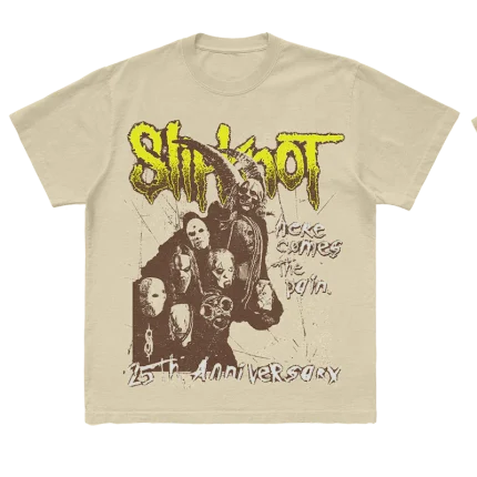 Tan t-shirt featuring a mask goat silhouette graphic with "Here Comes the Pain 25th Anniversary" on front and a goat silhouette on back